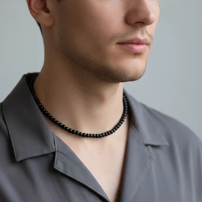 Black Tourmaline Beaded Necklace on a man's neck