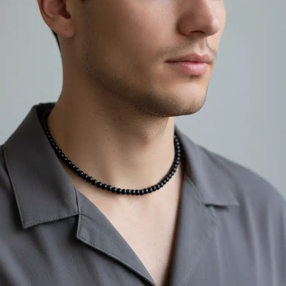 Black Tourmaline Beaded Necklace on a man's neck
