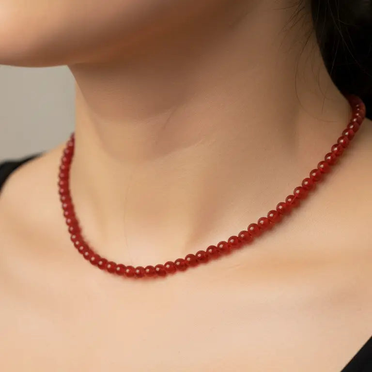 Carnelian Beaded Necklace on a woman's neck